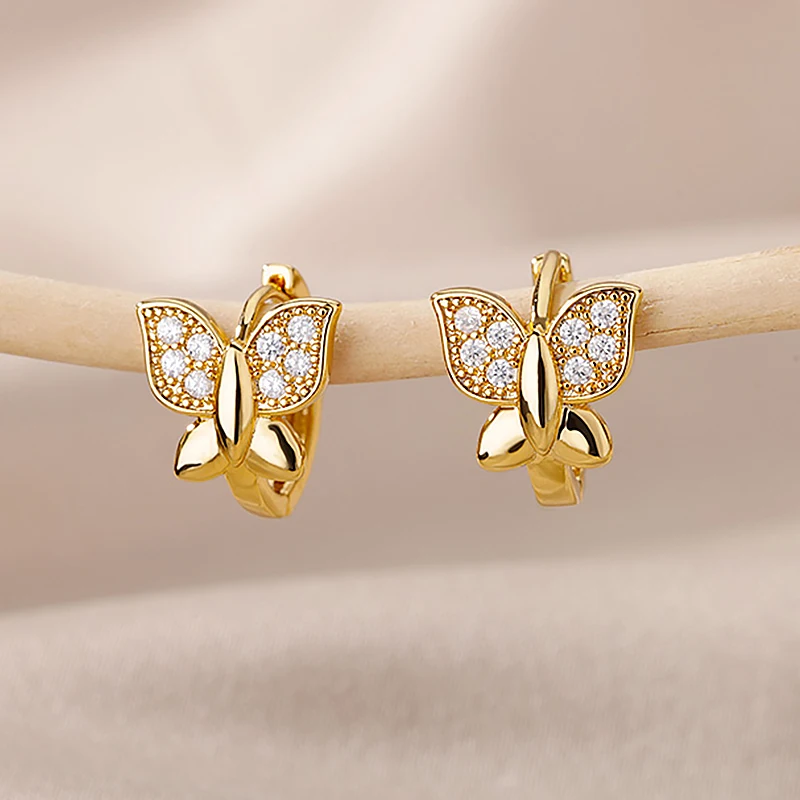 Boucles oreilles papillon dorees Winged Charm